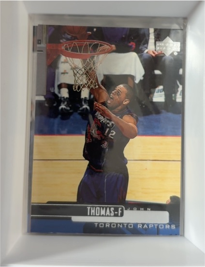 1999-00 Upper Deck #119 John Thomas — front