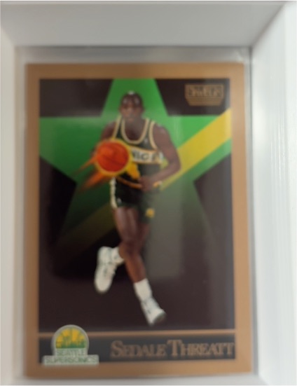 1990-91 SkyBox #273 Sedale Threatt — front