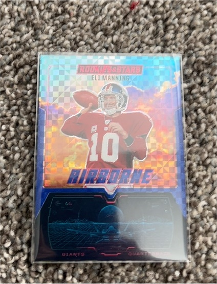 2025 Panini Rookies & Stars #10 Eli Manning Airborne Red Plaid Prizm — front