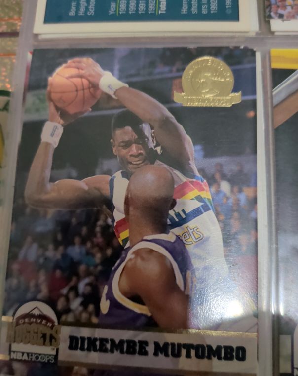 1993-94 NBA Hoops 5th Anniversary #56 Dikembe Mutombo — front