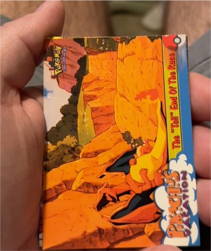 1999 Topps Pokemon Movie Edition Pikachu's Vacation #50 The "Tail" End of the Race Charizard — front