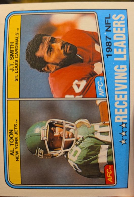 1988 Topps #216 1987 NFL Receiving Leaders J.T. Smith / Al Toon — front