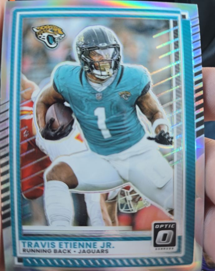 2025 Panini Donruss Optic #106 Travis Etienne Jr. — front