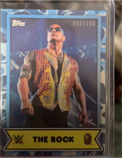 2025 Topps WWE x BAPE #3 The Rock Blue Camo #/150 — front