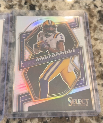 2023 Panini Select Draft Picks #UN-20 Justin Jefferson Unstoppable — front