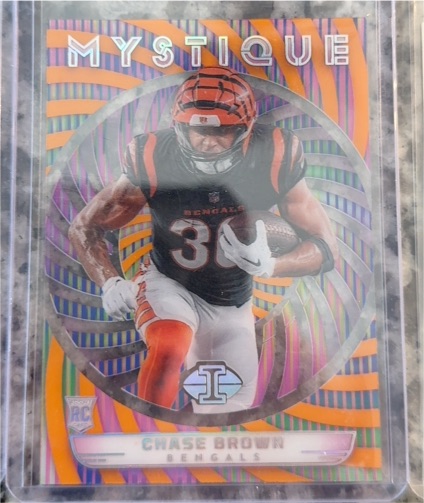 2023 Panini Illusions #5 Chase Brown Mystique Orange — front