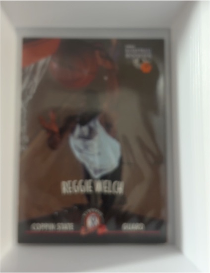 1997 Score Board Rookies #10 Reggie Welch — front