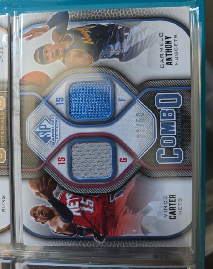 2009-10 Upper Deck SP Game Used Combo Materials #CM-CA Carmelo Anthony & Vince Carter — front