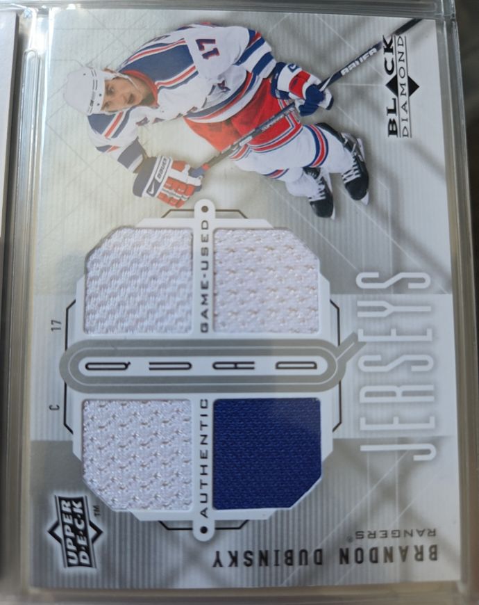 2009-10 Upper Deck Black Diamond #17 Brandon Dubinsky Quad Jersey — front