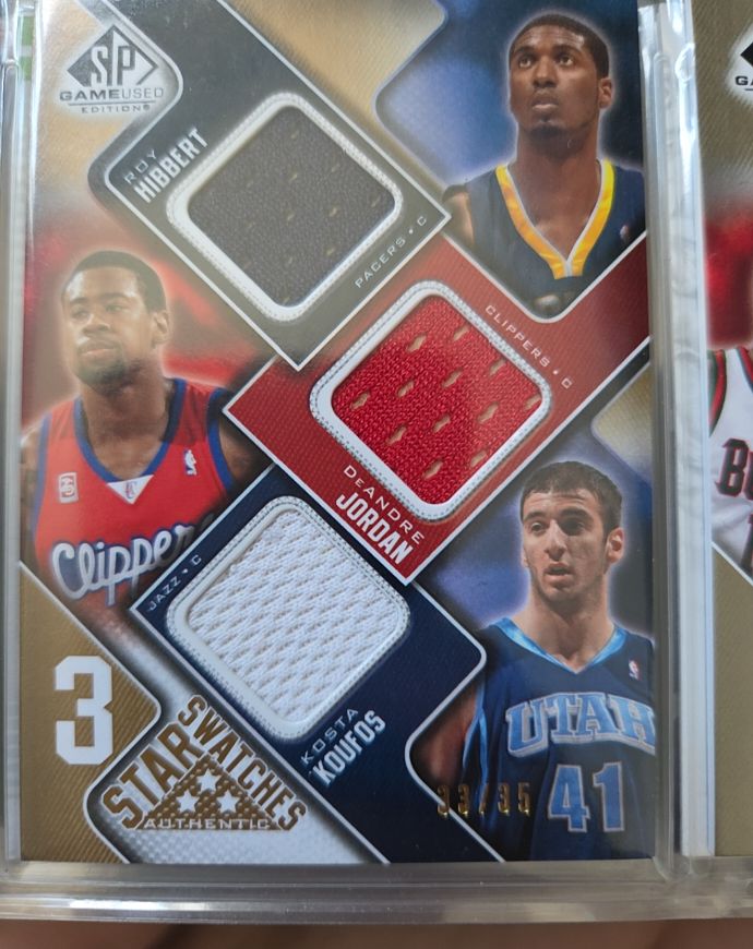 2009-10 SP Game Used 3 Star Swatches #3 Roy Hibbert/DeAndre Jordan/Kosta Koufos — front