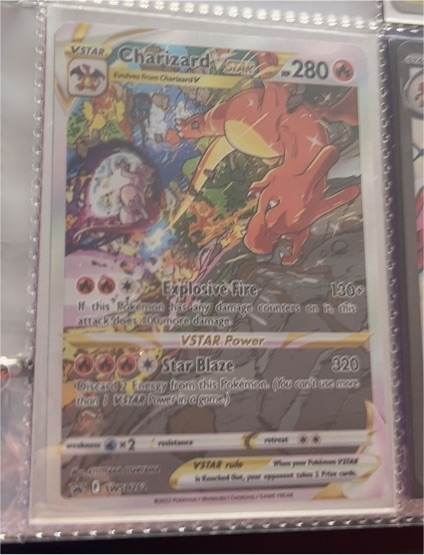 2022 Pokémon SWSH Black Star Promo #SWSH262 Charizard VSTAR — front