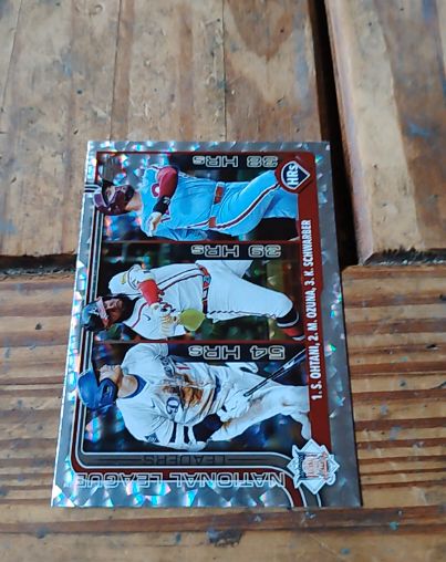 2025 Topps Series 1 #144 NL Home Run Leaders Shohei Ohtani / Marcell Ozuna / Kyle Schwarber — front