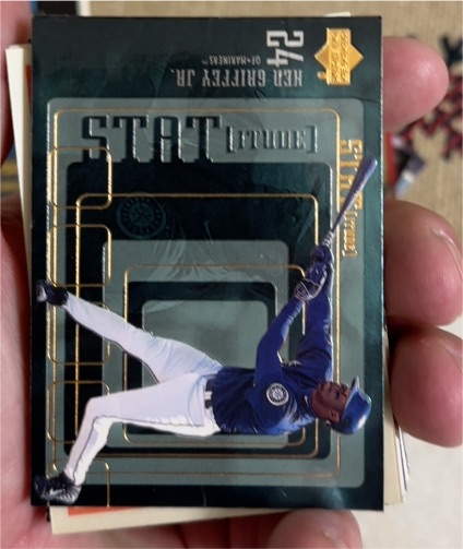 1999 Upper Deck Statitude #24 Ken Griffey Jr. — front