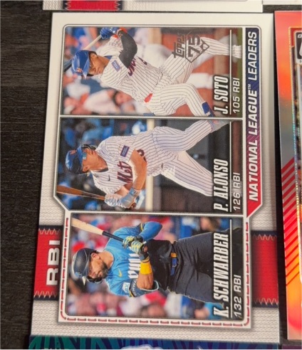2026 Topps Series 1 #11 National League RBI Leaders Kyle Schwarber / Pete Alonso / Juan Soto — front