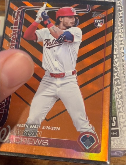 2025 Topps Update #US223 Dylan Crews Rookie Debut Holiday Orange & Black Foil — front