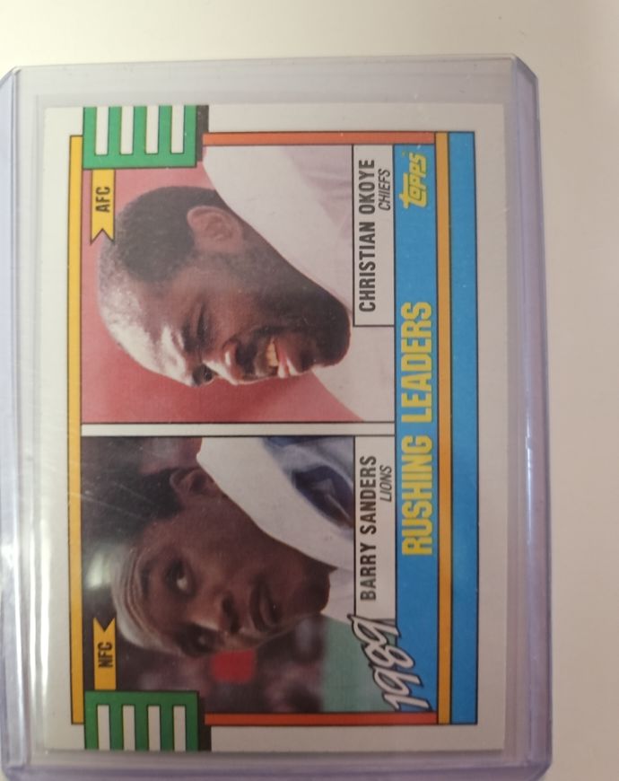 1990 Topps #28 Barry Sanders / Christian Okoye Rushing Leaders — front