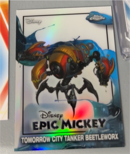 2026 Topps Chrome Disney Neon Epic Mickey #EM-22 Tomorrow City Tanker Beetleworx — front