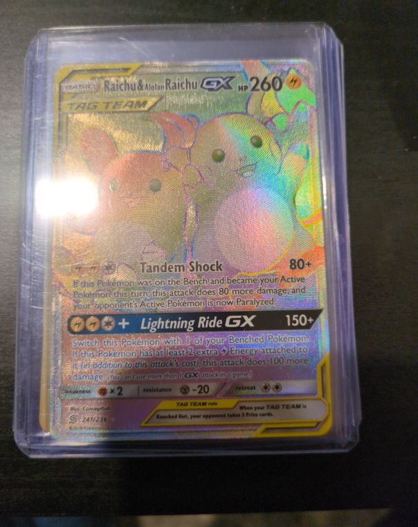 2019 Pokémon Unified Minds #241 Raichu & Alolan Raichu GX Secret Rare — front