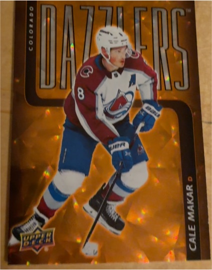 2025-26 Upper Deck Series 1 Dazzlers Orange #DZ-31 Cale Makar — front