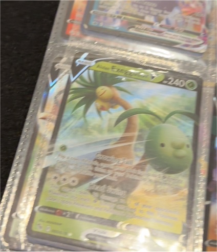 2022 Pokemon SV08 Surging Sparks #133 Alolan Exeggutor ex — front