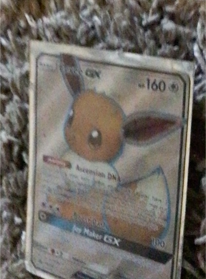 Pokémon TCG Eevee GX SM242 — front