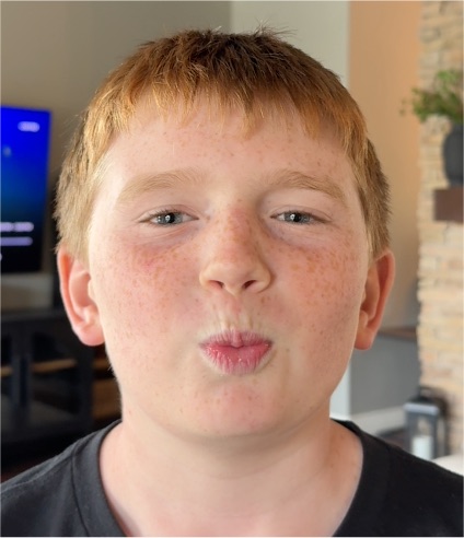 Benjamin Stockham Smiling Headshot Photo — front