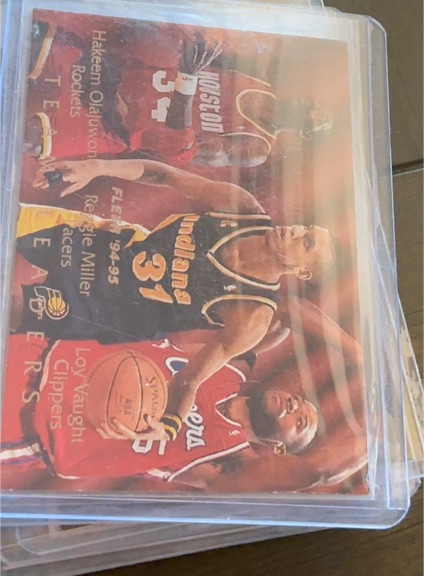 1994-95 Fleer #4 Hakeem Olajuwon / Reggie Miller / Loy Vaught Team Leaders — front