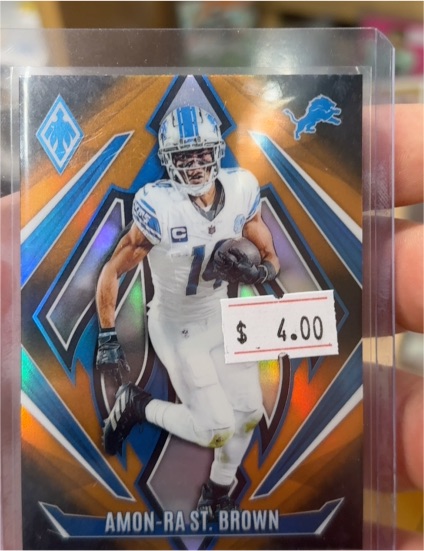 2024 Panini Phoenix #8 Amon-Ra St. Brown — front