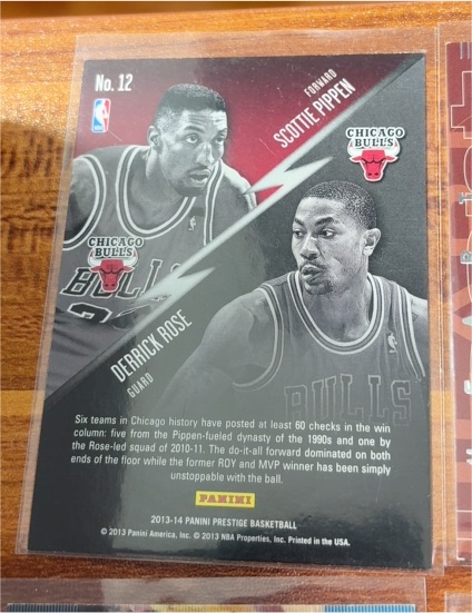 2013-14 Panini Prestige #12 Scottie Pippen / Derrick Rose Connections — front