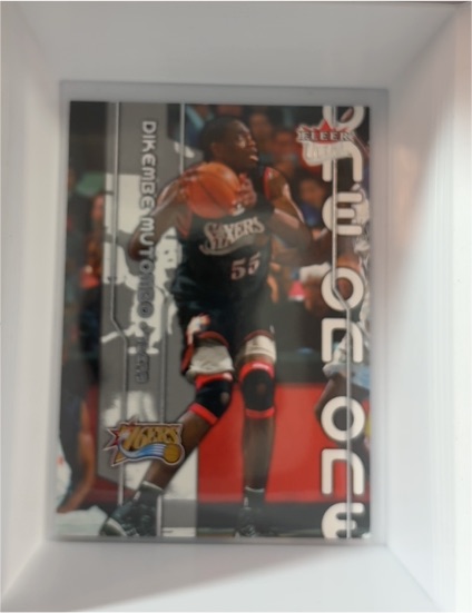 2002-03 Fleer Ultra One on One #6 Dikembe Mutombo / Alonzo Mourning — front