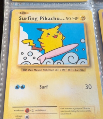 1999 Wizards of the Coast Surfing Pikachu #28 — front