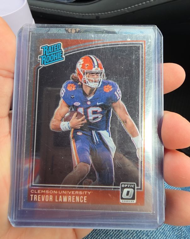 2021 Panini Chronicles Draft Picks Donruss Optic #201 Trevor Lawrence — front