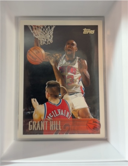 1996-97 Topps #100 Grant Hill — front