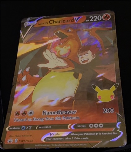 2021 Pokémon TCG Celebrations #SWSH133 Lance's Charizard V — front