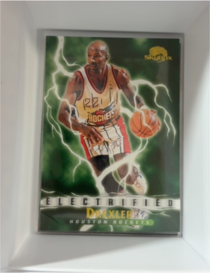1995-96 Skybox Premium #285 Clyde Drexler Electrified Houston Rockets — front