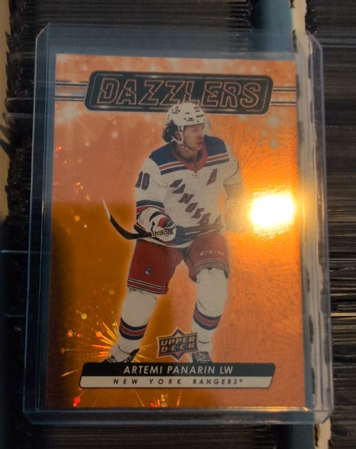 2023-24 Upper Deck Series 2 Orange Dazzlers #DZ-76 Artemi Panarin — front
