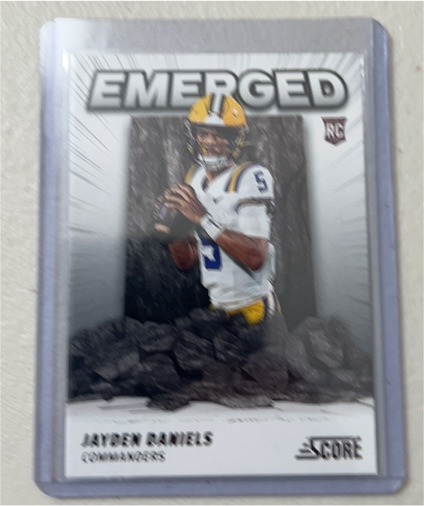 2024 Panini Score Emerged #EM-JDS Jayden Daniels — front
