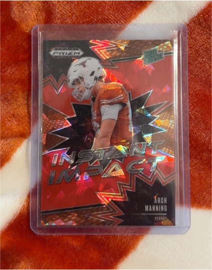 2025 Panini Prizm Draft Picks #II-AMG Arch Manning Instant Impact Red Ice — front