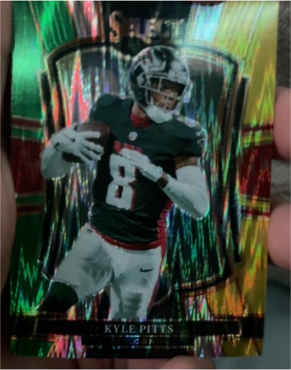 2025 Panini Select #147 Kyle Pitts Green and Yellow Prizm Shock — front
