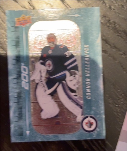 2023-24 Upper Deck Series 1 #DM-92 Connor Hellebuyck 200' x 85' — front