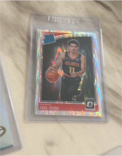 2018-19 Panini Donruss Optic #198 Trae Young Rated Rookie Shock Prizm — front