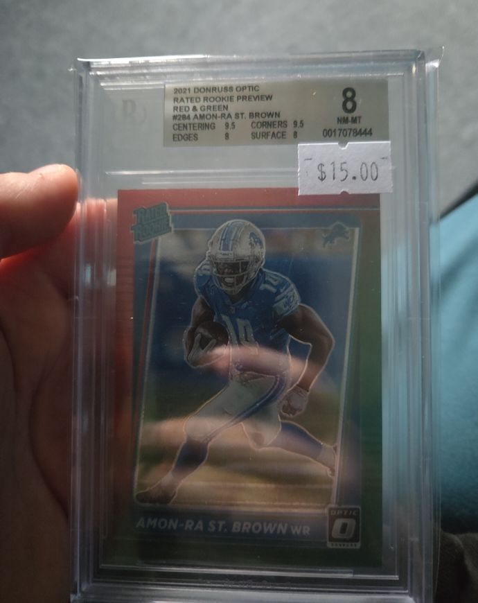 2021 Donruss Optic Rated Rookie Preview #284 Amon-Ra St. Brown Red & Green — front