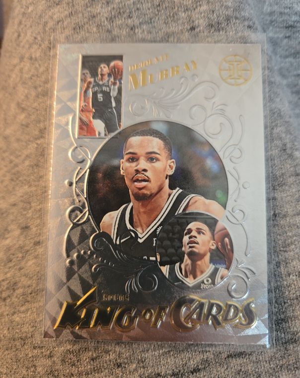 2021-22 Panini Illusions #21 Dejounte Murray King of Cards — front
