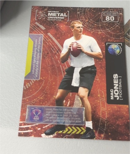 2021 Skybox Metal Universe Champions #80 Mac Jones — front