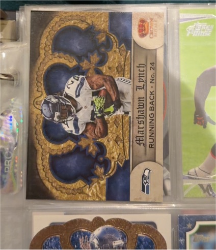 2012 Panini Crown Royale #130 Marshawn Lynch — front