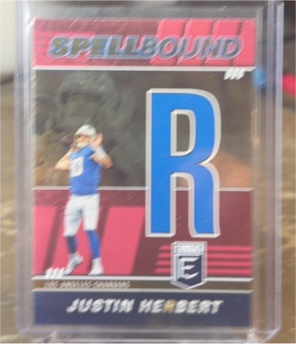 2022 Panini Donruss Elite Spellbound "R" Justin Herbert #SB-JH3 — front