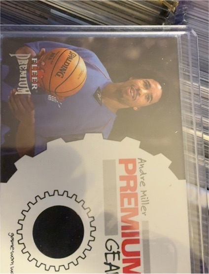 2002-03 Fleer Premium #NNO Andre Miller Premium Gear Game-Worn Warmups — front