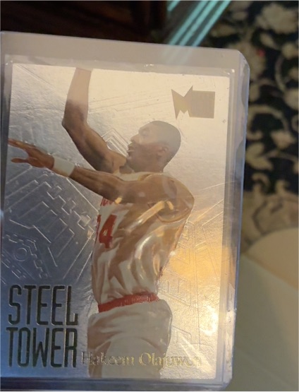 1995-96 Fleer Metal #6 Hakeem Olajuwon Steel Tower — front