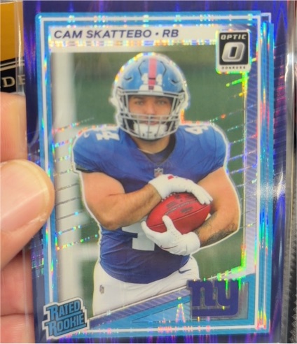 2025 Panini Donruss Optic #228 Cam Skattebo Rated Rookie Purple Shock Prizm — front
