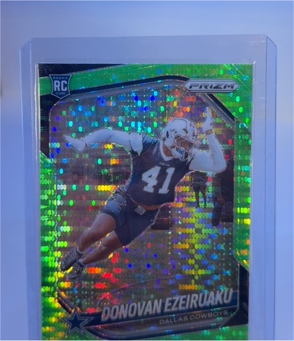 2025 Panini Prizm #314 Donovan Ezeiruaku Neon Green Pulsar Prizm Rookie — front